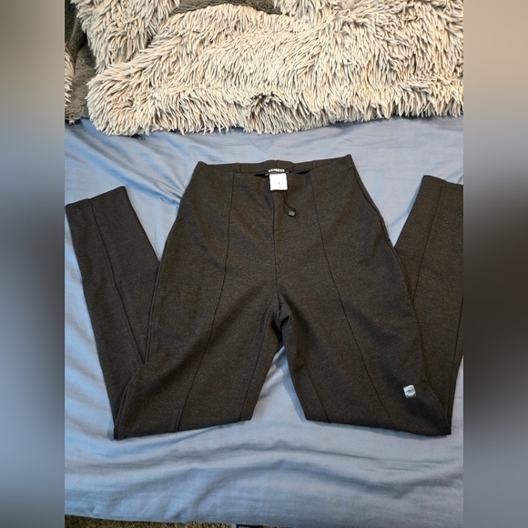 Express Black leggings with permanent crease down the leggings and back of legs. - Picture 1 of 5